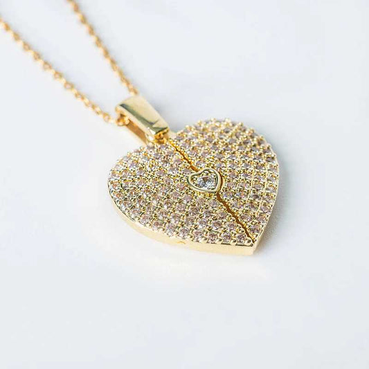 Elegant gold open close heart necklace